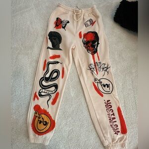 Graphic Beige Sweatpants with Red Accents